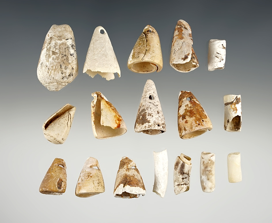 Set of 18 nicely styled Shell Cone Pendants found in New Mexico. The largest is 1 3/8".