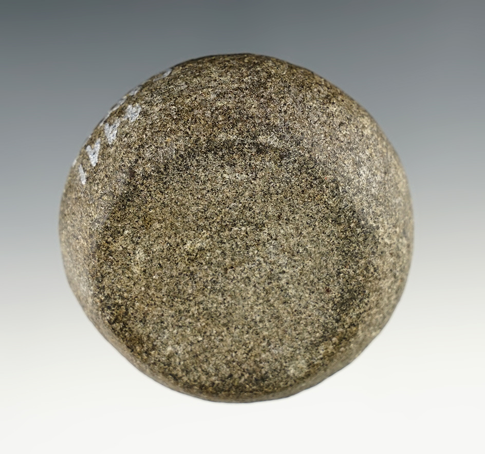 Well made 2 3/8" Cupped Discoidal found in Cass Co., Michigan. Ex. John Lutz.  Davis COA.