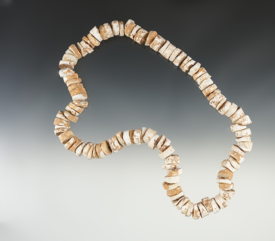 Nice 20" strand of Shell Beads found in Mendota, Virginia in the 1960's. Comes with a Davis COA.