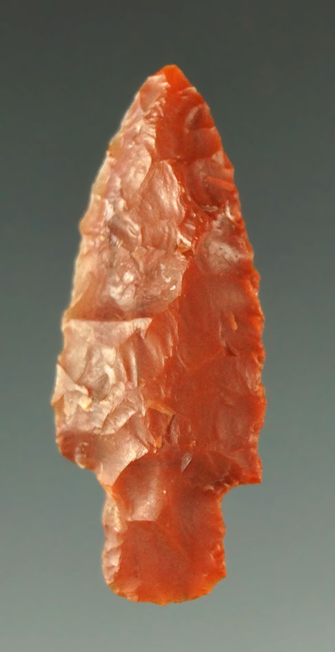 1 1/4" Rose Springs point made from red/orange chalcedony found in southeast Arizona.