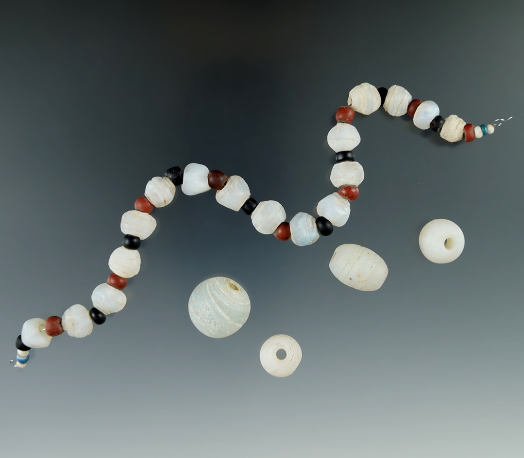 Rare! 8 1/2"strand of drilled beads - trade and beautiful rare opalescent stone faceted beads.