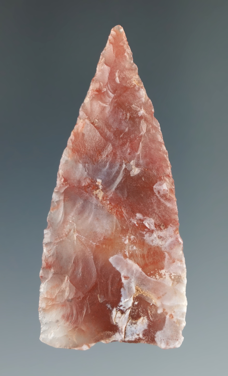 2 3/8" triangular knife made from attractive clear and red chalcedony found in Utah.