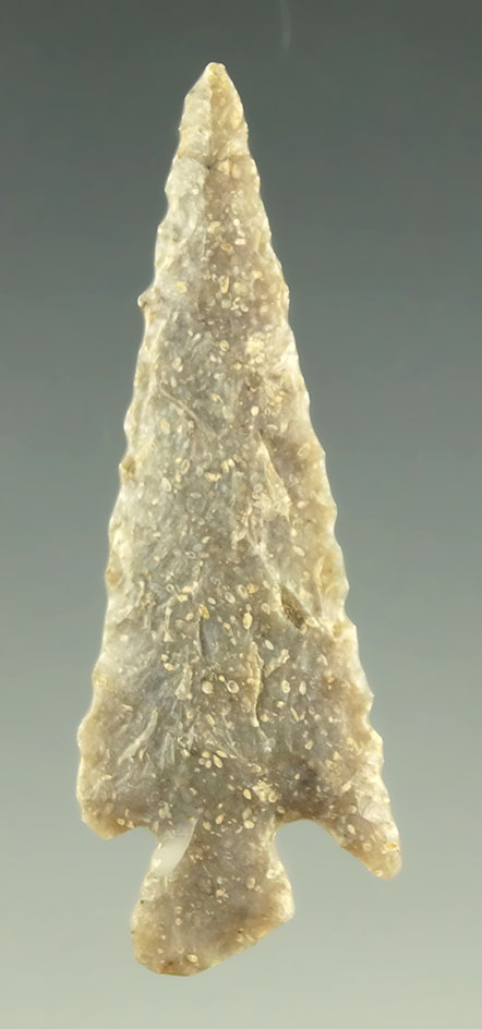 1 9/16" nicely patinated arrowhead found in Wyoming. Ex. Bob Roth.