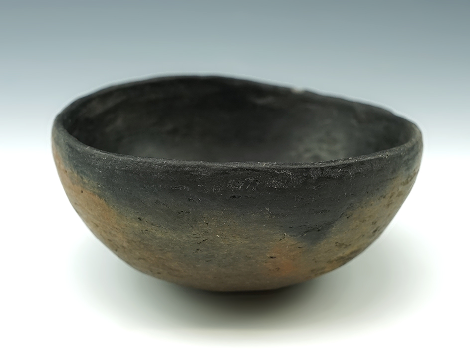 4 3/8" Diameter ancient Southwestern pottery bowl in solid condition. Found in New Mexico.