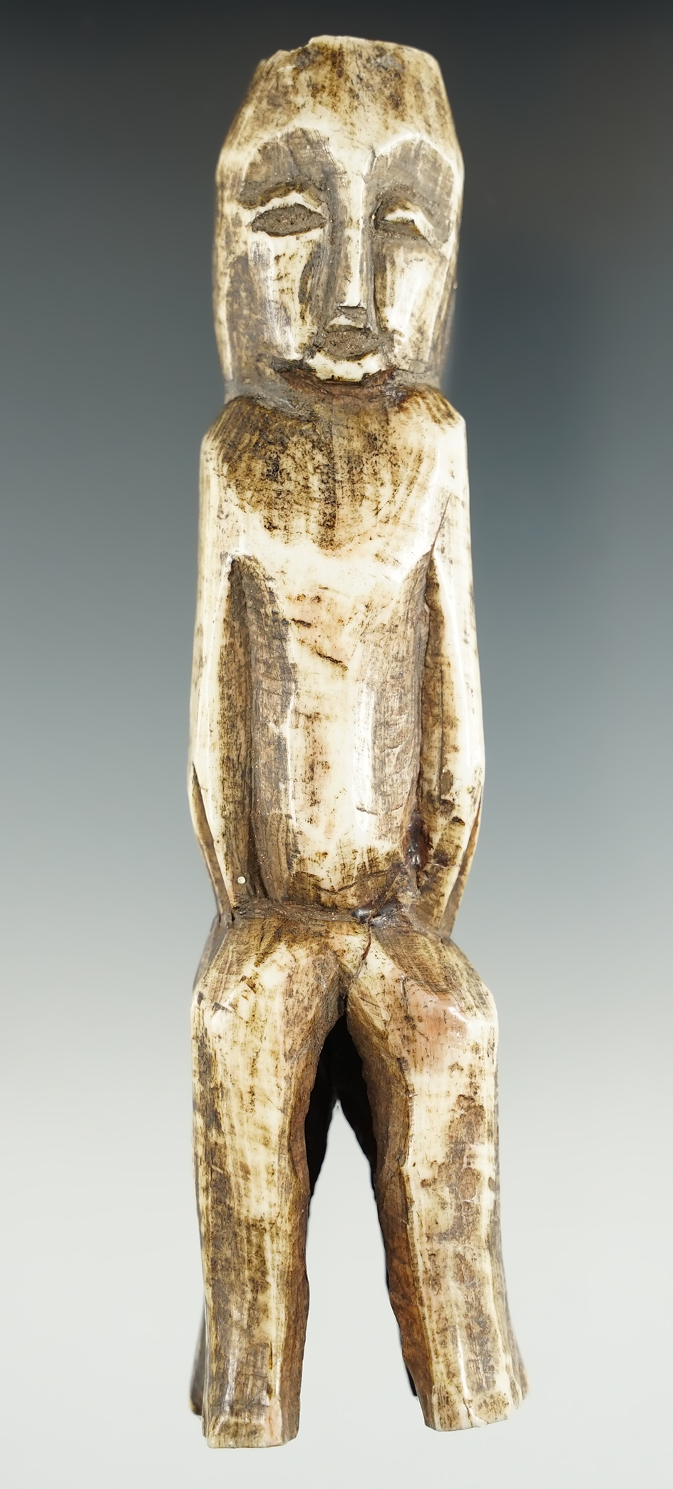 5 1/2" Tall African carved human figure made from bone.