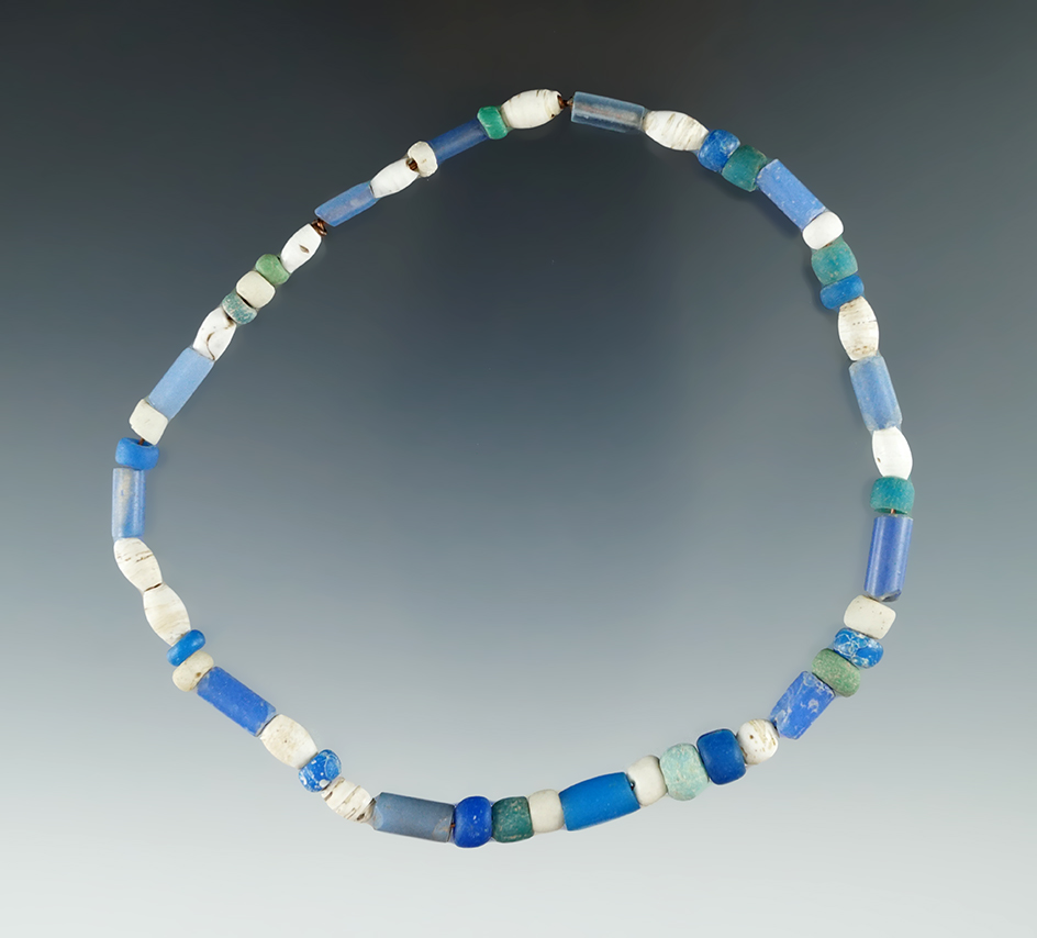 12" Long strand of glass trade and Shell Beads, circa 1676-1720. Aiken Co., South Carolina.