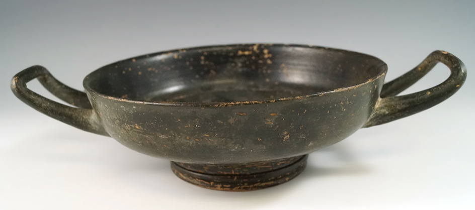 8 1/2" wide Greek  Kylix Wine Cup.  Greek Apulian Blackware, circa. 400 B.C.