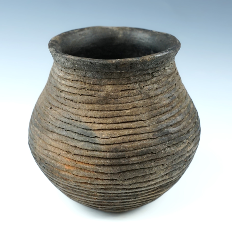 Beautiful coil design on this 3 5/8" Tall by 4 1/8" Wide Pottery Vessel found in New Mexico.