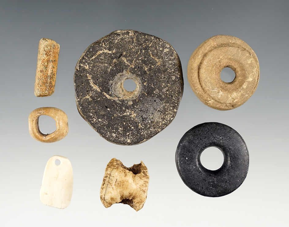 Group of 7 Assorted Artifacts including drilled stone, bone and pottery. Largest is 1 3/4".