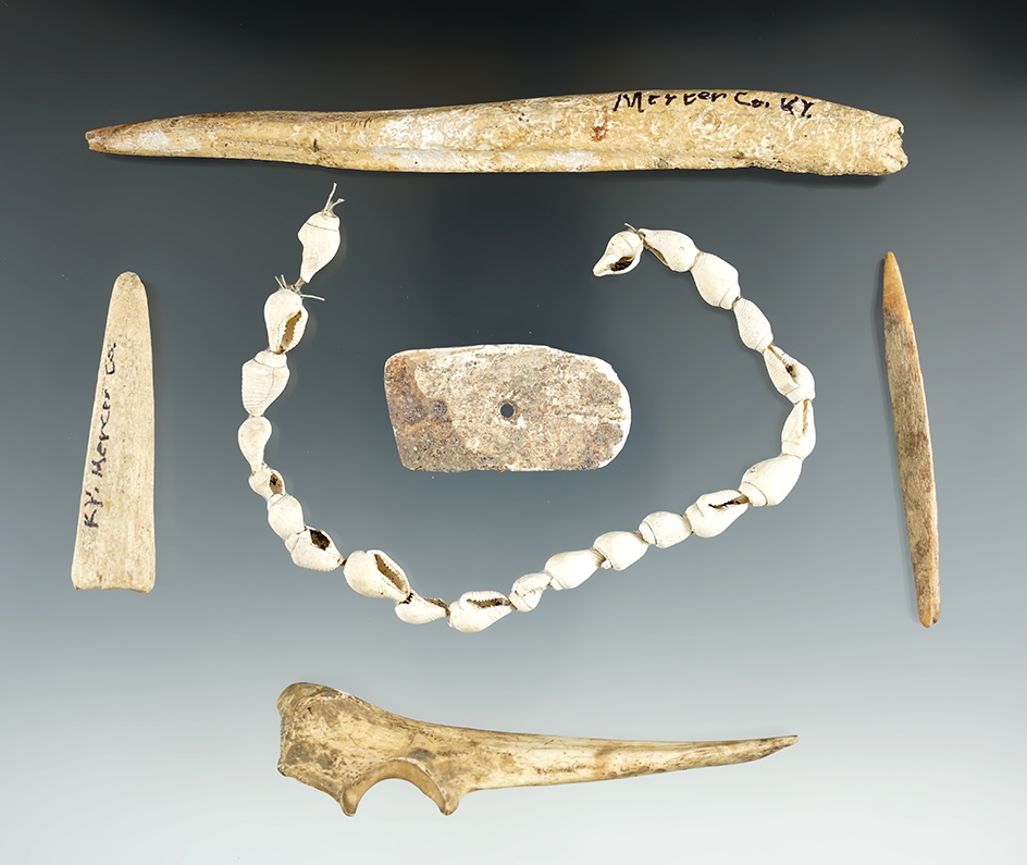 Set of bone and shell artifacts found together at the Eddy site in Mercer Co.,Kentucky.