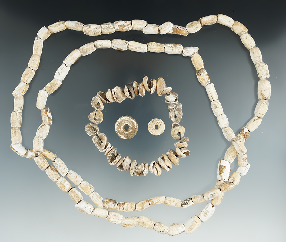 Two strands of shell beads and 2 loose beads all found on a site in East Texas, one is 38", oner is