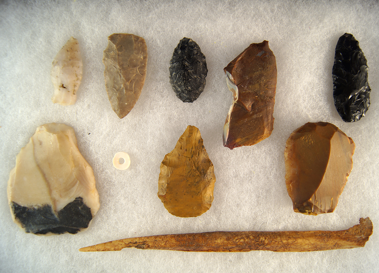 Group of assorted artifacts: a bone awl, arrowheads, scrapers and Knives - Columbia River