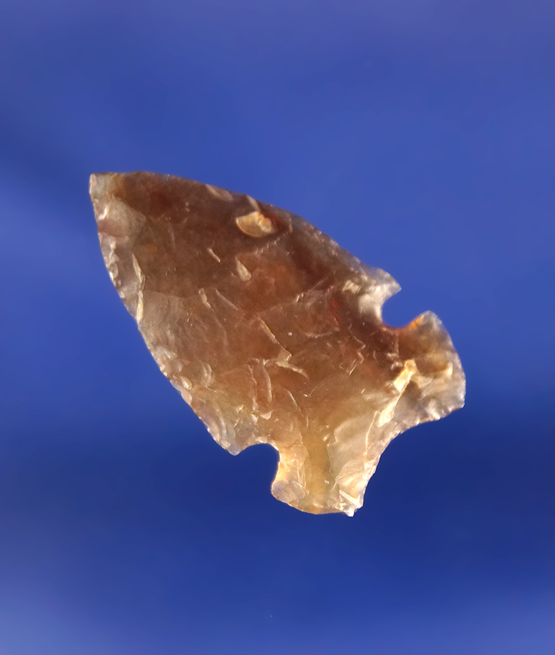 15/16" thin and well flaked Emigrant point- Knife River Flint that is translucent found in Montana.