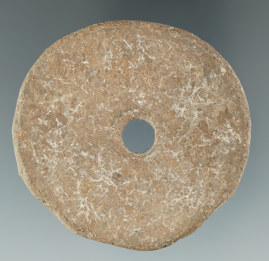 2 5/16" Drilled Stone Disk found in Alaska. Comes with a Bennett COA.