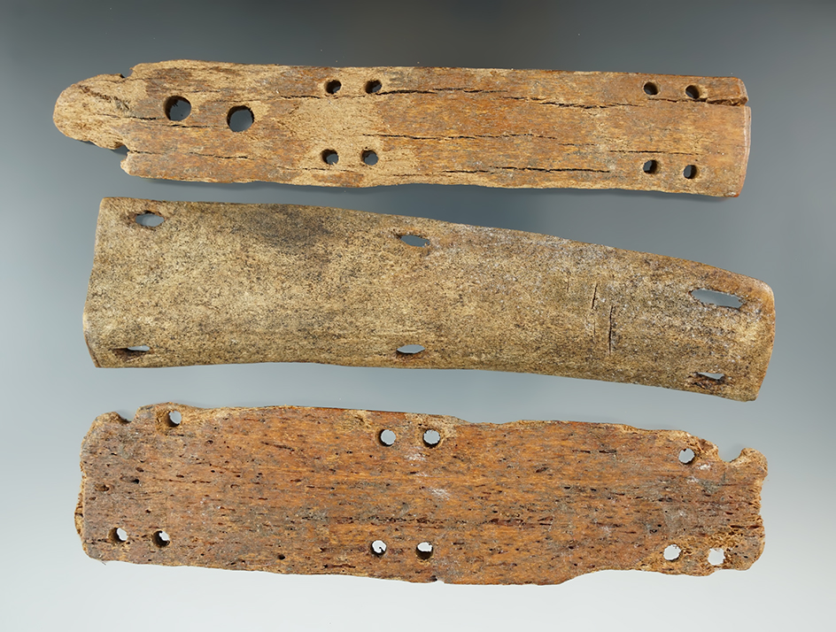 Set of three sections of Inuit bone armor found in Alaska. Largest is 5 7/8".