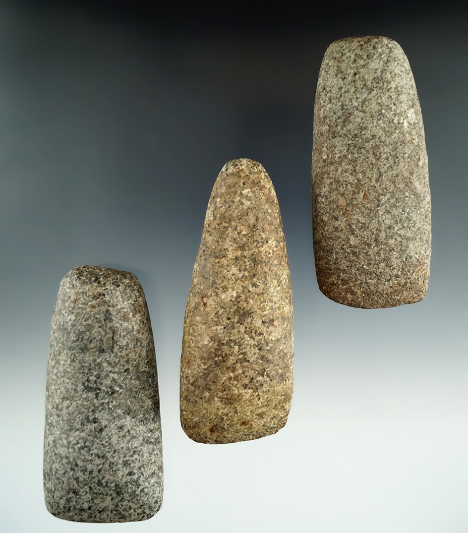 Set of three stone tools including two Celts and an Adze found in Michigan. Largest is 3 9/16".