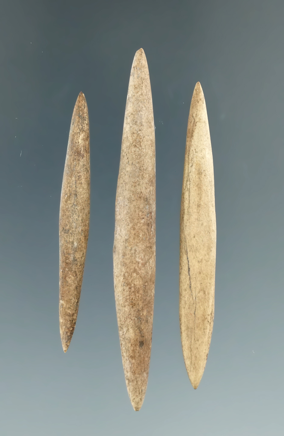 Set of three bi-pointed bone arrow tips, largest is 2 5/8".
