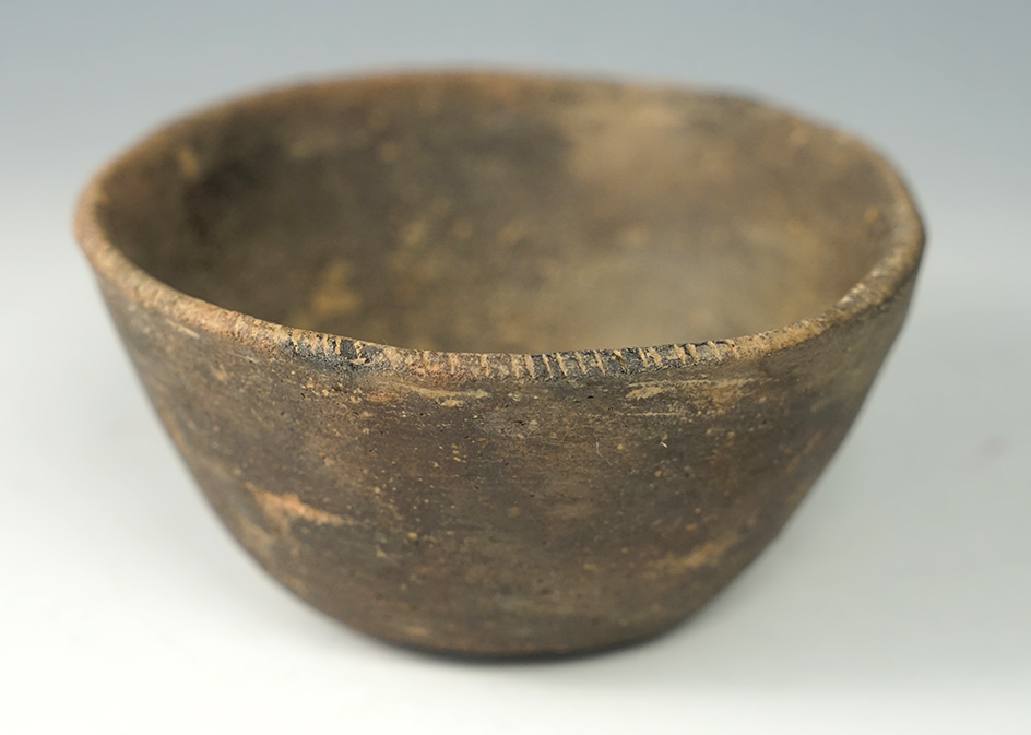 Nice! 4" wide by 2" tall miniature clay bowl with minor restoration to one part of rim. Tennessee.