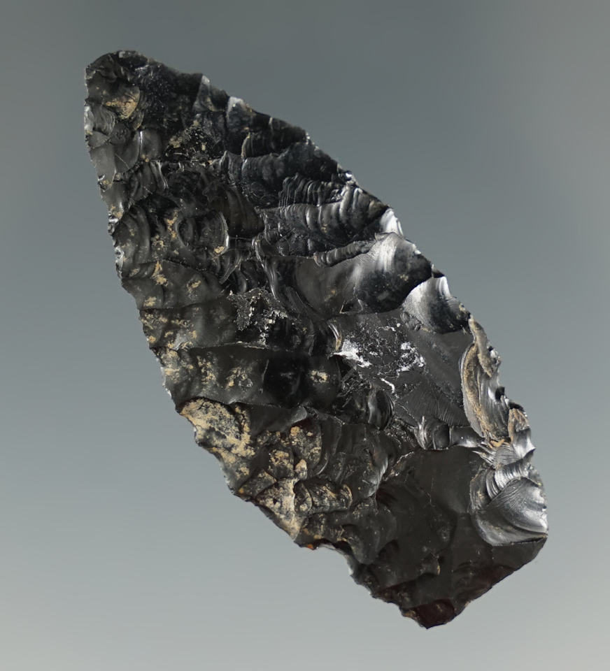 2" Obsidian Paleo Owl Cave found in Wyoming near the Idaho boarder. Pictured in Overstreet #8