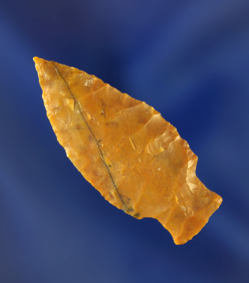 1 1/2" Stemmed Dartpoint made from beautiful material that is thin and nicely flaked. Wyoming.