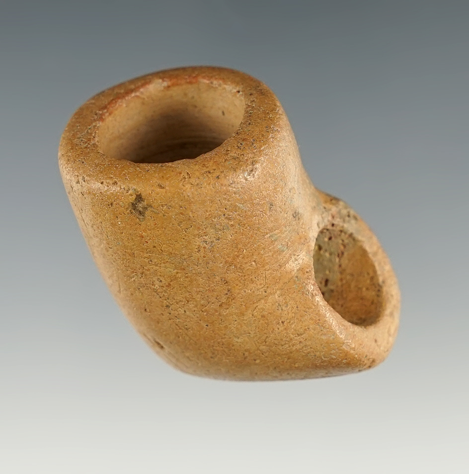 1 1/4" tall Elbow Pipe that is nicely patinated.