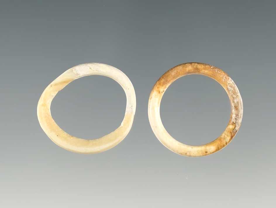 Pair of Bone Rings found in Arizona. One has been restored. The largest is 15/16".
