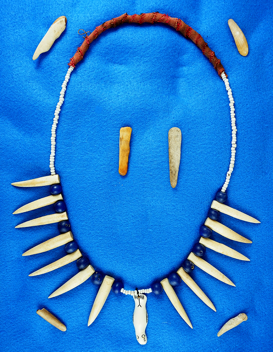 Nice Eskimo flaking tools and necklace from Alaska. From the old Beryl Ladd collection, 1960.
