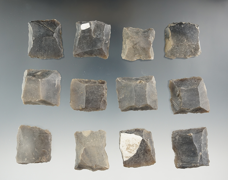 Set of 12 black powder gun flints.