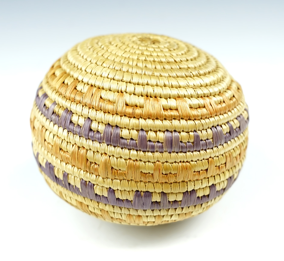 Northwest Coast  woven rattle that measures 3 1/2" wide.