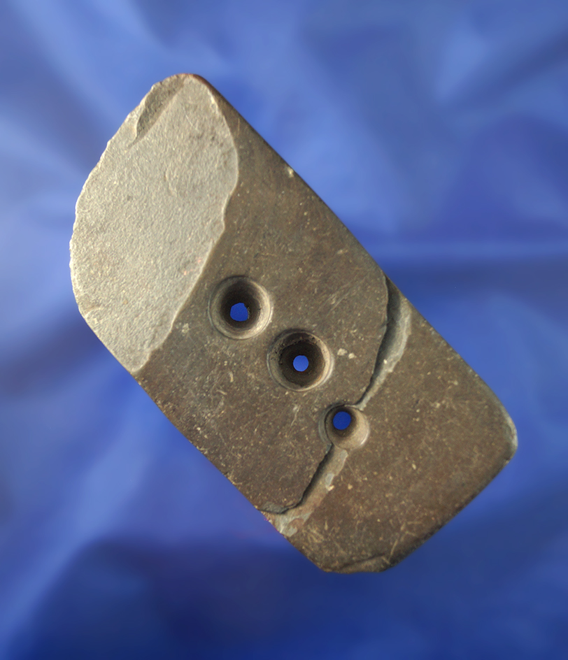 3 7/16" three hole slate pendant/Gorget that is damaged and broken and glued found in Ohio.