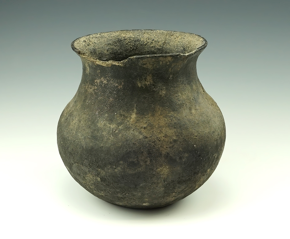 6 1/4" tall Taos Vase with some chipping to rim area and a couple pressure cracks.