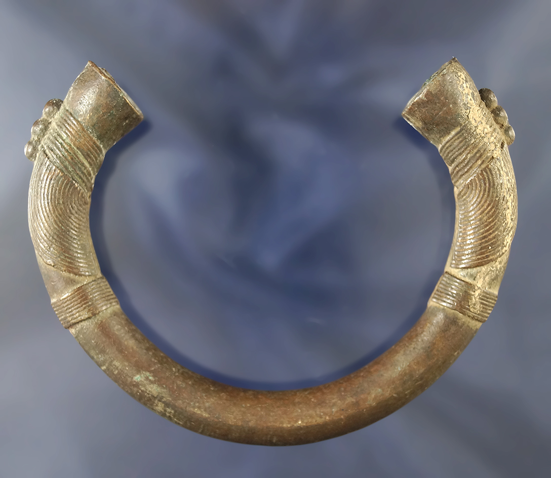 Very unique 4" beautifully decorated solid copper African "bracelet money" in perfect condition. T