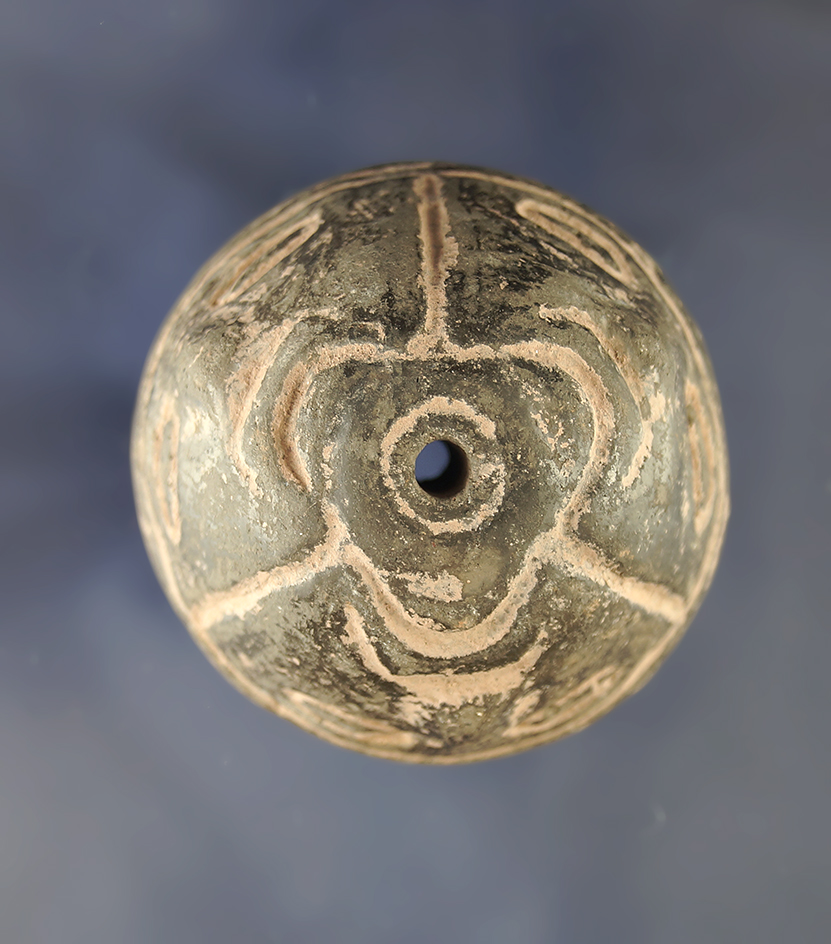 Highly decorated 2 1/8" PreColumbian Spindle Whorl with three face images incised carved.