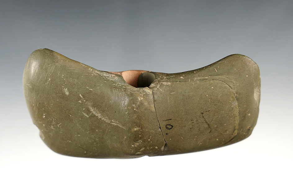 Nicely styled 4 5/8" Eastern Bannerstone. Broken and glued with restoration on one side.