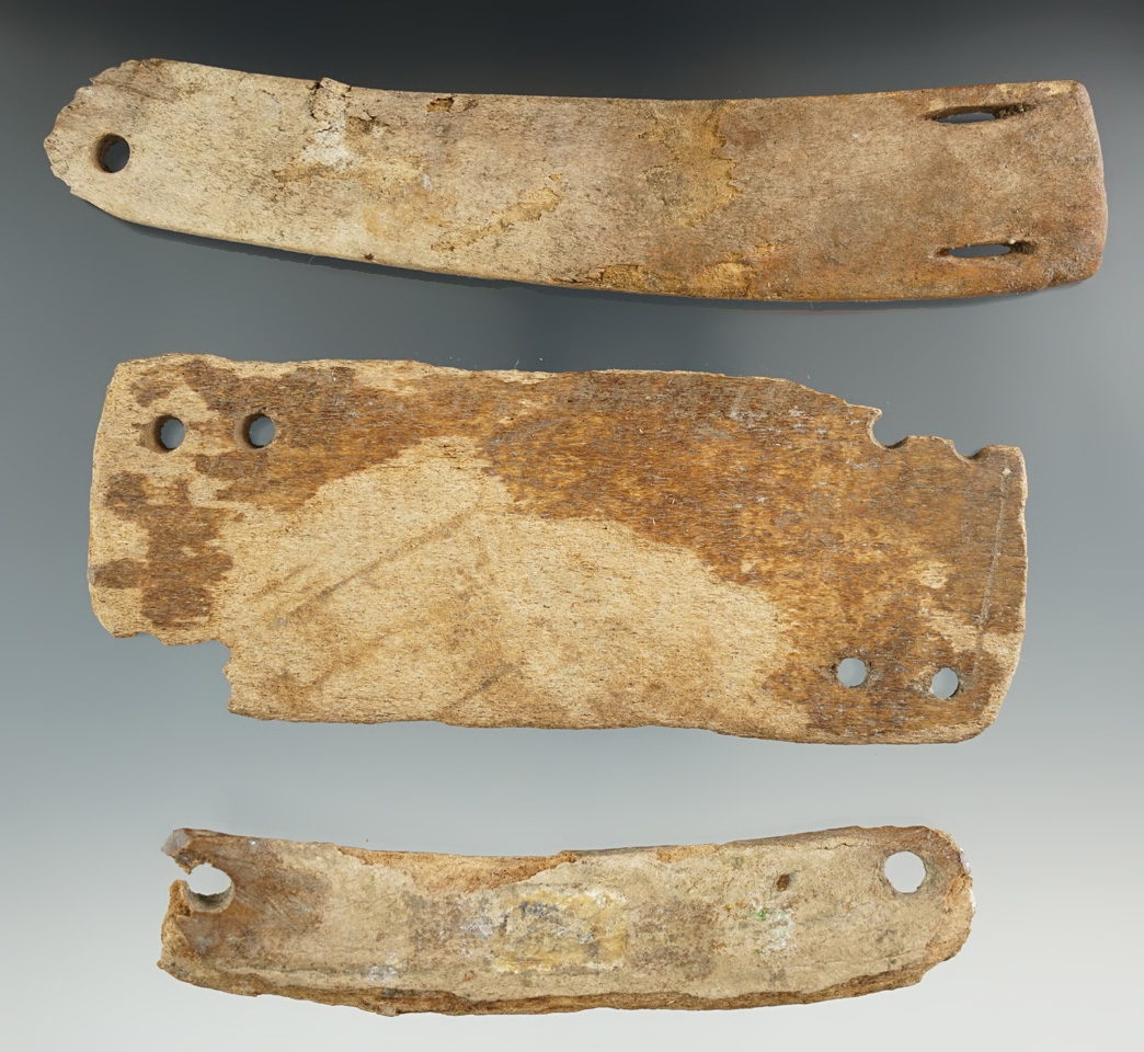 Set of three pieces of Inuit bone armor , largest is 5 13/16".