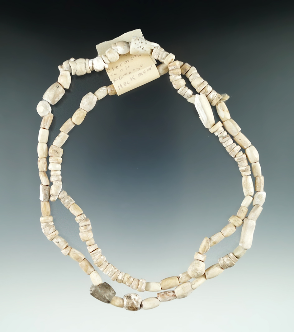 30" Long nice strand of Drilled Shell Beads found at the Clark site, Clermont Co., Ohio.