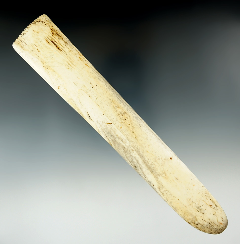 7 5/8" well styled Inuit bone Flesher in excellent condition. From Alaska.