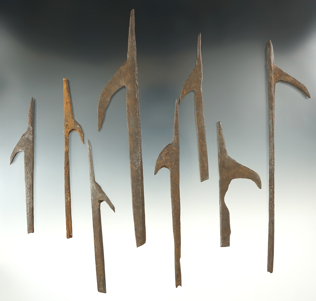 Set of eight vintage iron harpoon tips from Alaska, largest is 6 1/4".