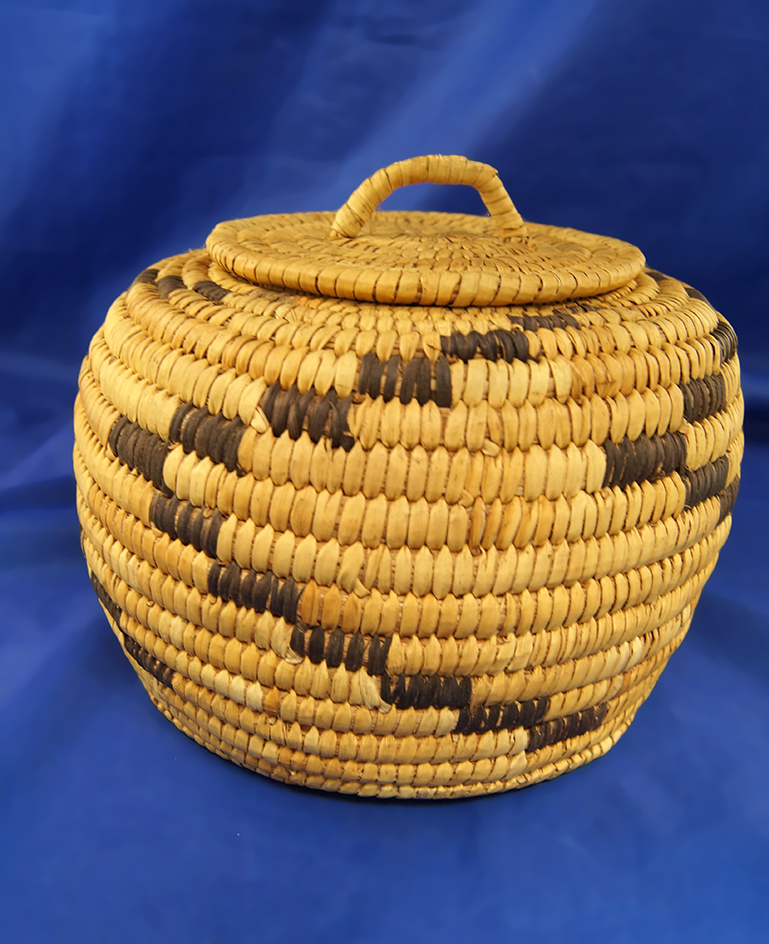 6 1/2" Diameter nicely woven lidded basket in excellent condition.