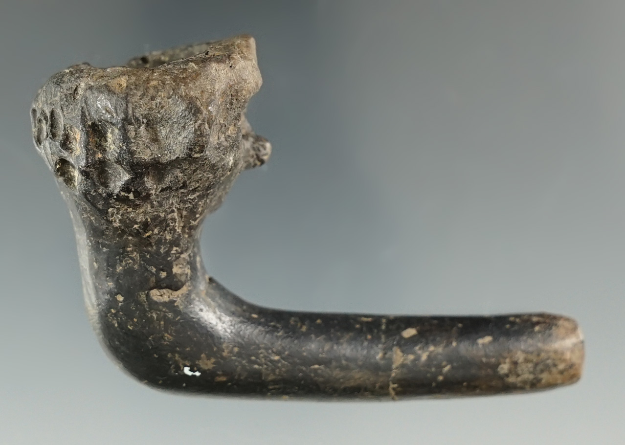 3" Long Human Face Effigy Iroquois Clay Pipe which is broken and mended, found in New York.