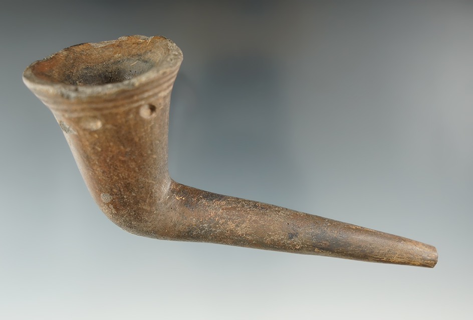 5 1/4" Long by 2 1/4 tall Iroquois clay Trumpet Pipe which is broken and mended - New York.
