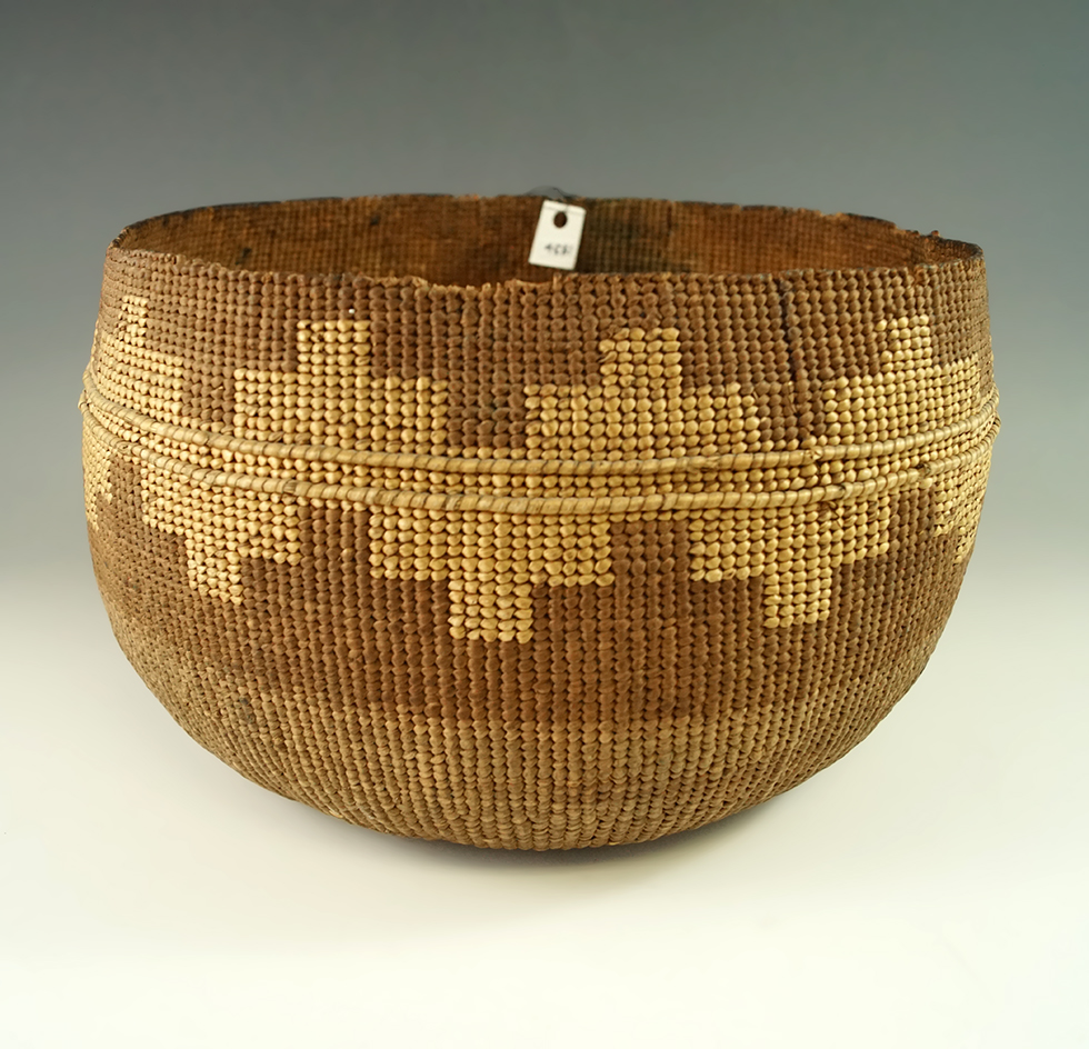 Nicely woven 8 3/4" diameter by 5" tall California basket.