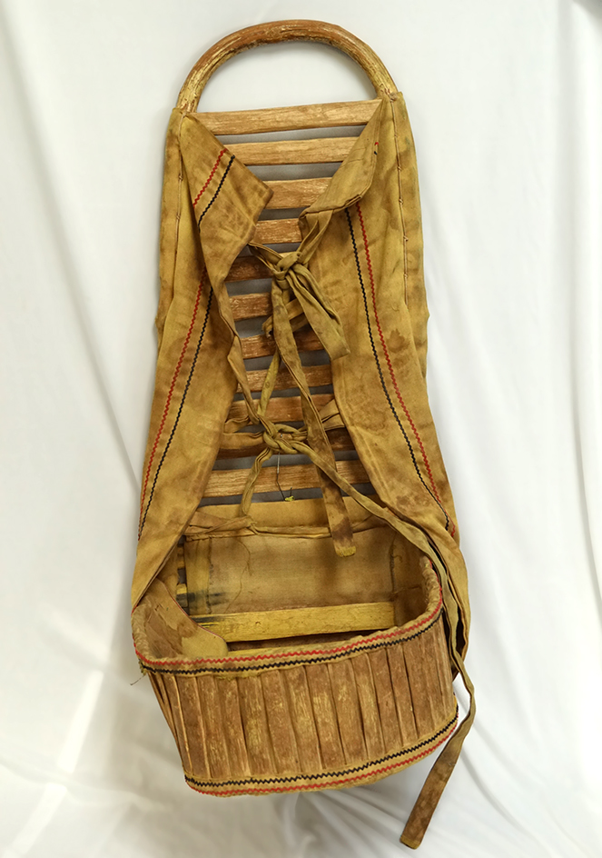 Apache Cradle Board with cactus wood slats from the first quarter of the 20th century.