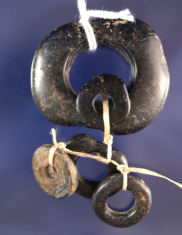 5 Polished Steatite Rings ranging from 5/8" to 1 1/4" diameters. Ex. Bill Peterson.