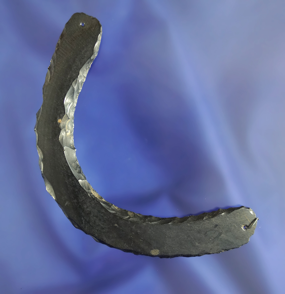 3 7/8"  Pre-Columbian Obsidian Crescent that is drilled at both ends for suspension. Mexico.