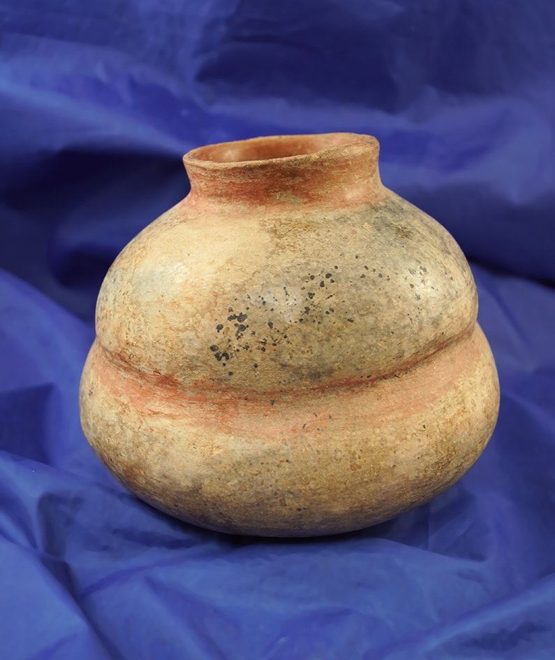 Very uniquly styled 6" wide x 5 1/4" tall Pre-Columbian bottle with nice maganese deposits.