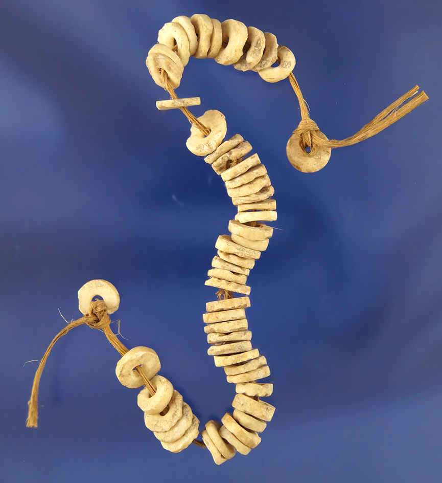 Set of drilled stone beads found in a rock shelter in Perry County Indiana.