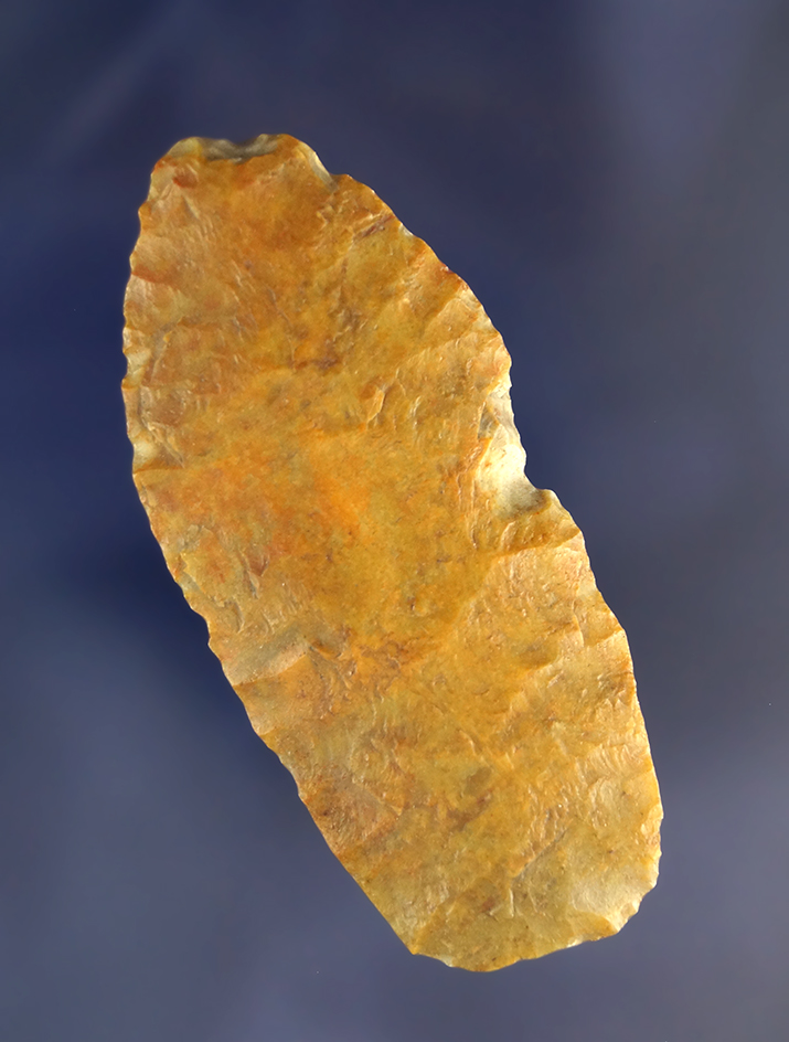 2 3/4" Heavily Patinated Paleo Lanceolate found in Indiana with nicely ground lower edges.