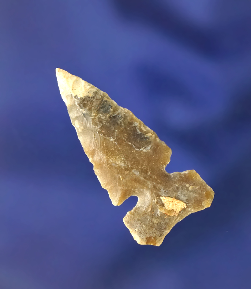 Well patinated 1 3/8" Sidenotch Triangle point found in Colorado.