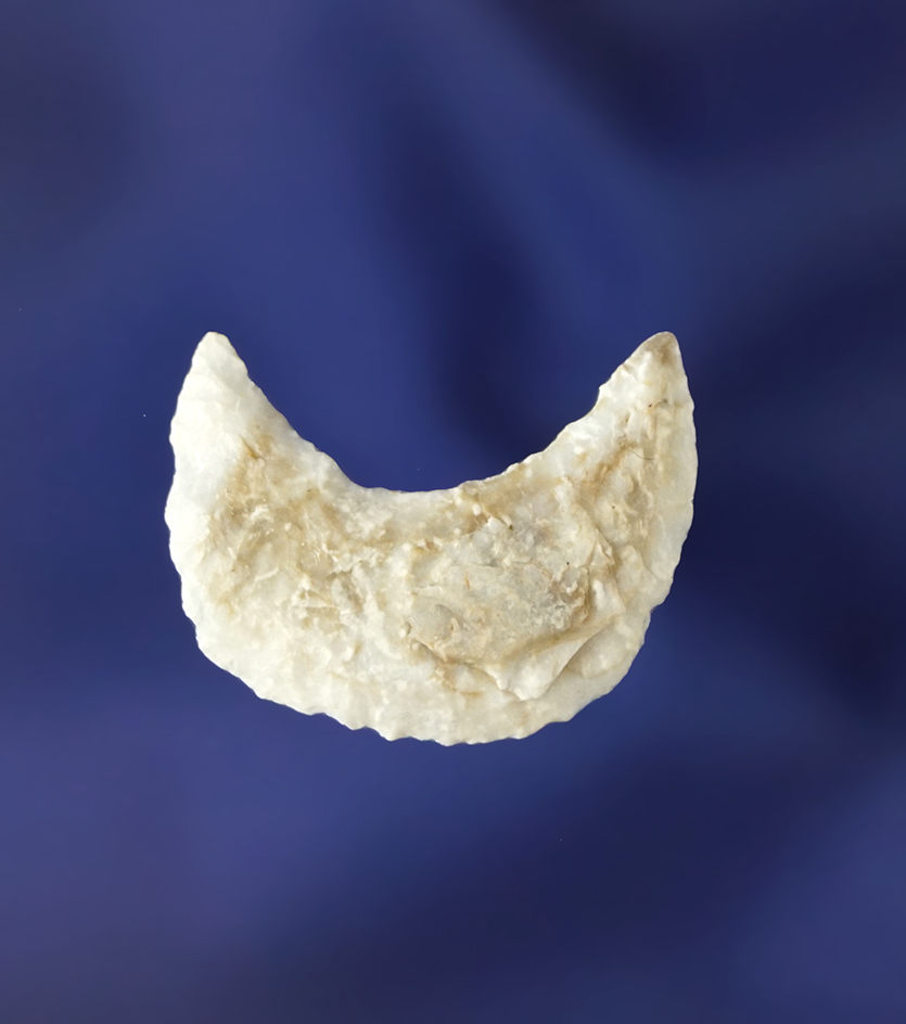 1" heavily patinated Crescent Scraper found in New Mexico.